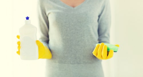 Local cleaner treating fabric chairs during upholstery cleaning